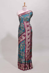 Green zari striped floral design dola silk saree with contrast zari border and printed blouse