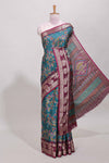 Green zari striped floral design dola silk saree with contrast zari border and printed blouse