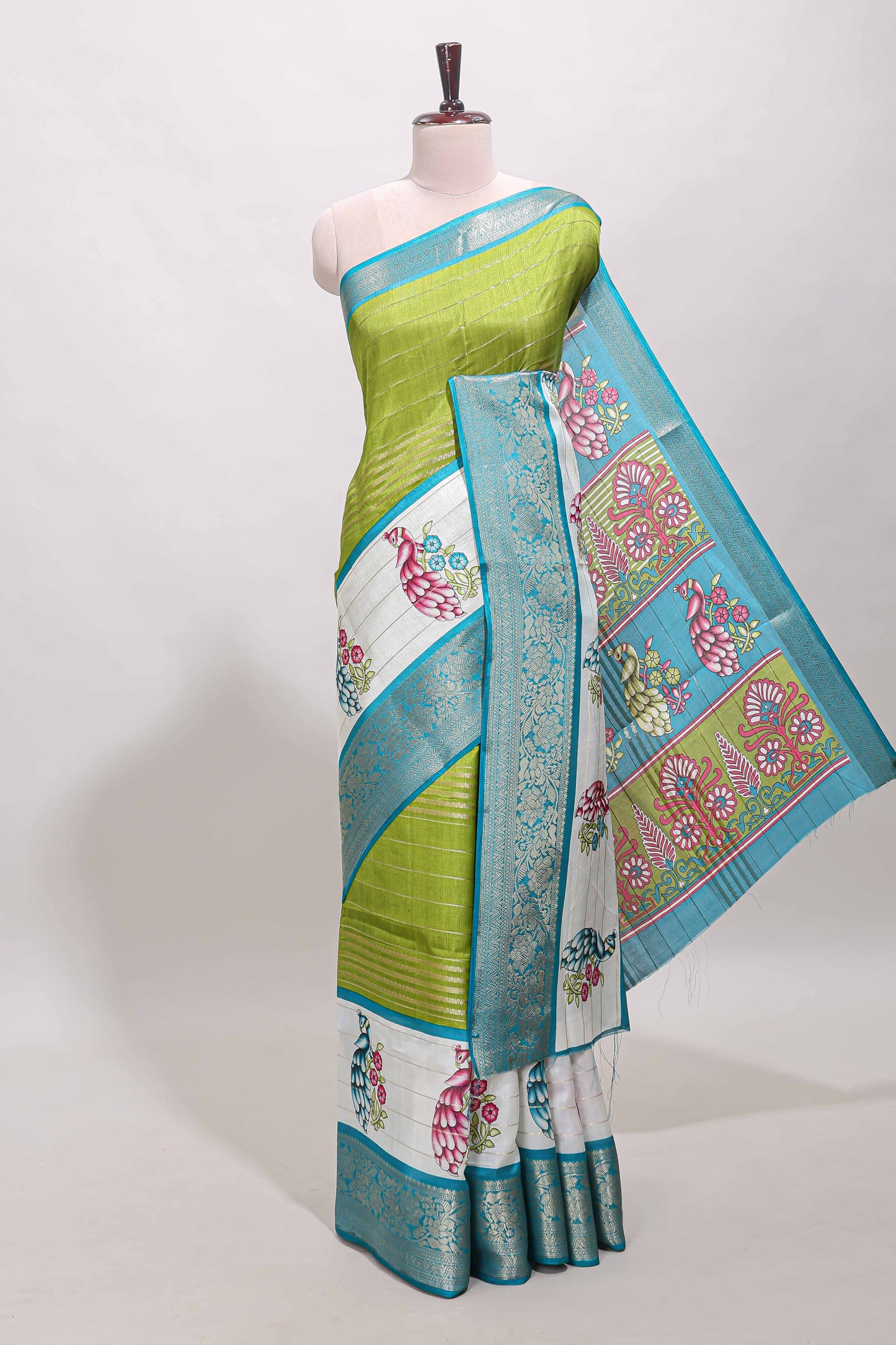 Green stripes dola silk saree with bottom peacock design, contrast zari border and printed pallu