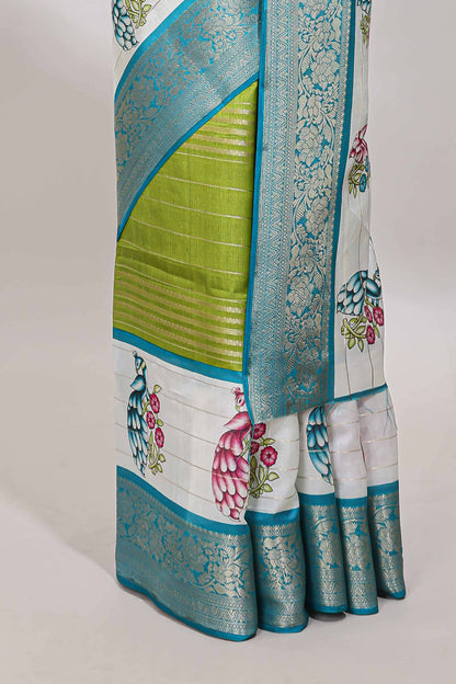 Green stripes dola silk saree with bottom peacock design, contrast zari border and printed pallu