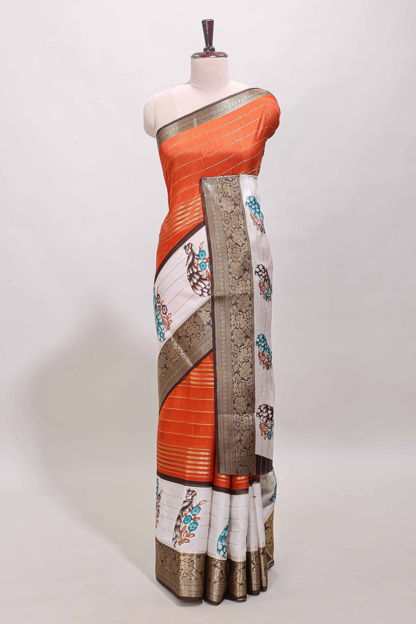 Orange stripes dola silk saree with bottom peacock design, contrast zari border and printed pallu
