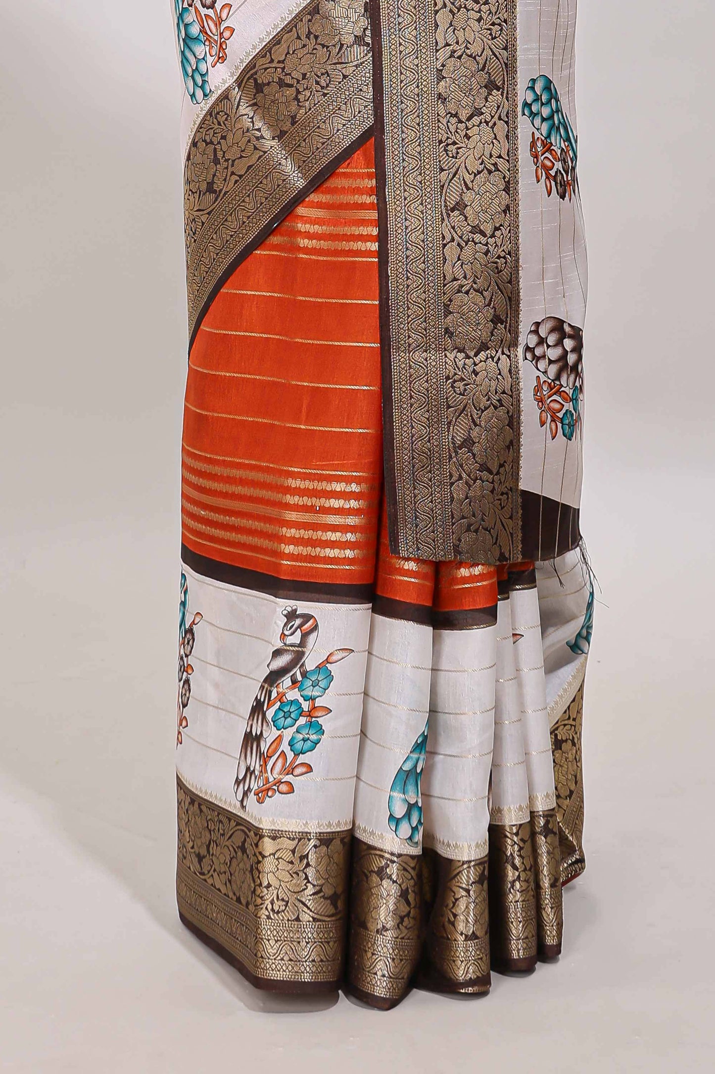 Orange stripes dola silk saree with bottom peacock design, contrast zari border and printed pallu