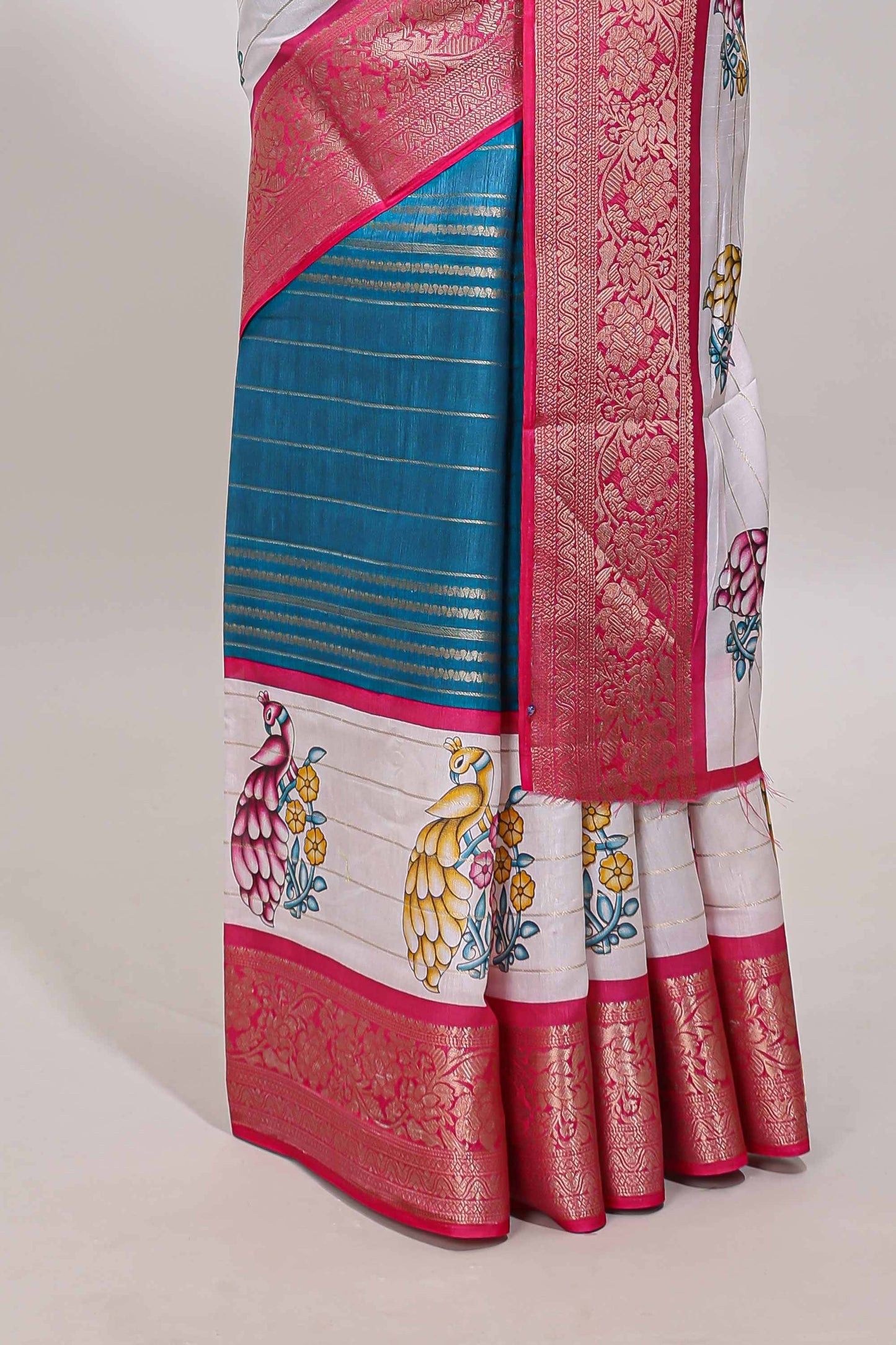 Blue stripes dola silk saree with bottom peacock design, contrast zari border and printed pallu