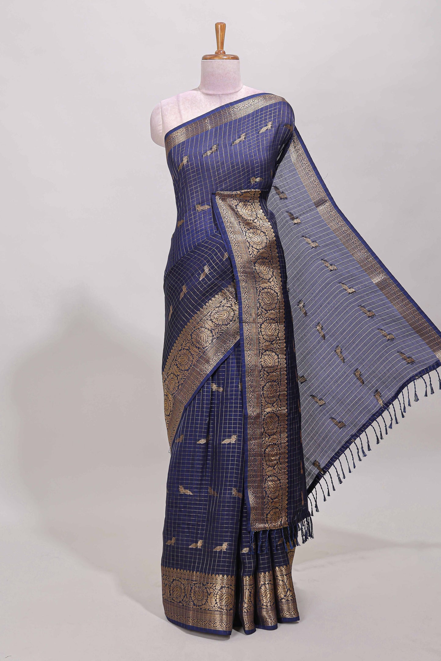 Blue checked peacock zari motifs dola silk saree with self zari border and matching blouse