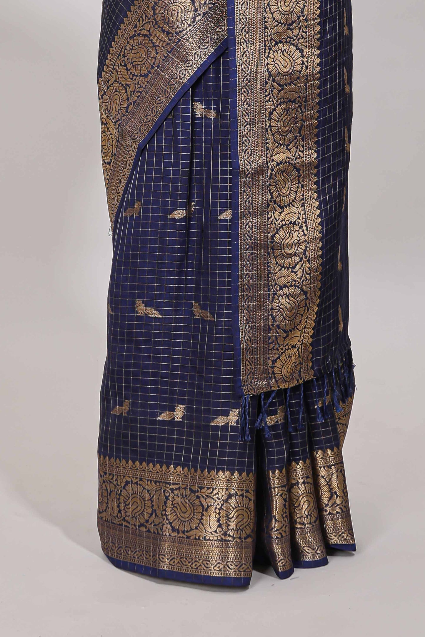 Blue checked peacock zari motifs dola silk saree with self zari border and matching blouse