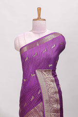 Purple checked peacock zari motifs dola silk saree with self zari border and matching blouse