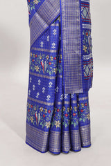 Blue checked floral design dola saree with self zari border and matching blouse