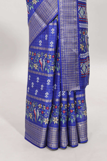Blue checked floral design dola saree with self zari border and matching blouse