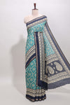 Turquoise green floral vine print chanderi cotton saree with contrast border and blouse