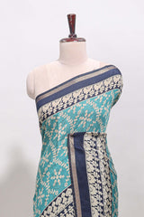 Turquoise green floral vine print chanderi cotton saree with contrast border and blouse
