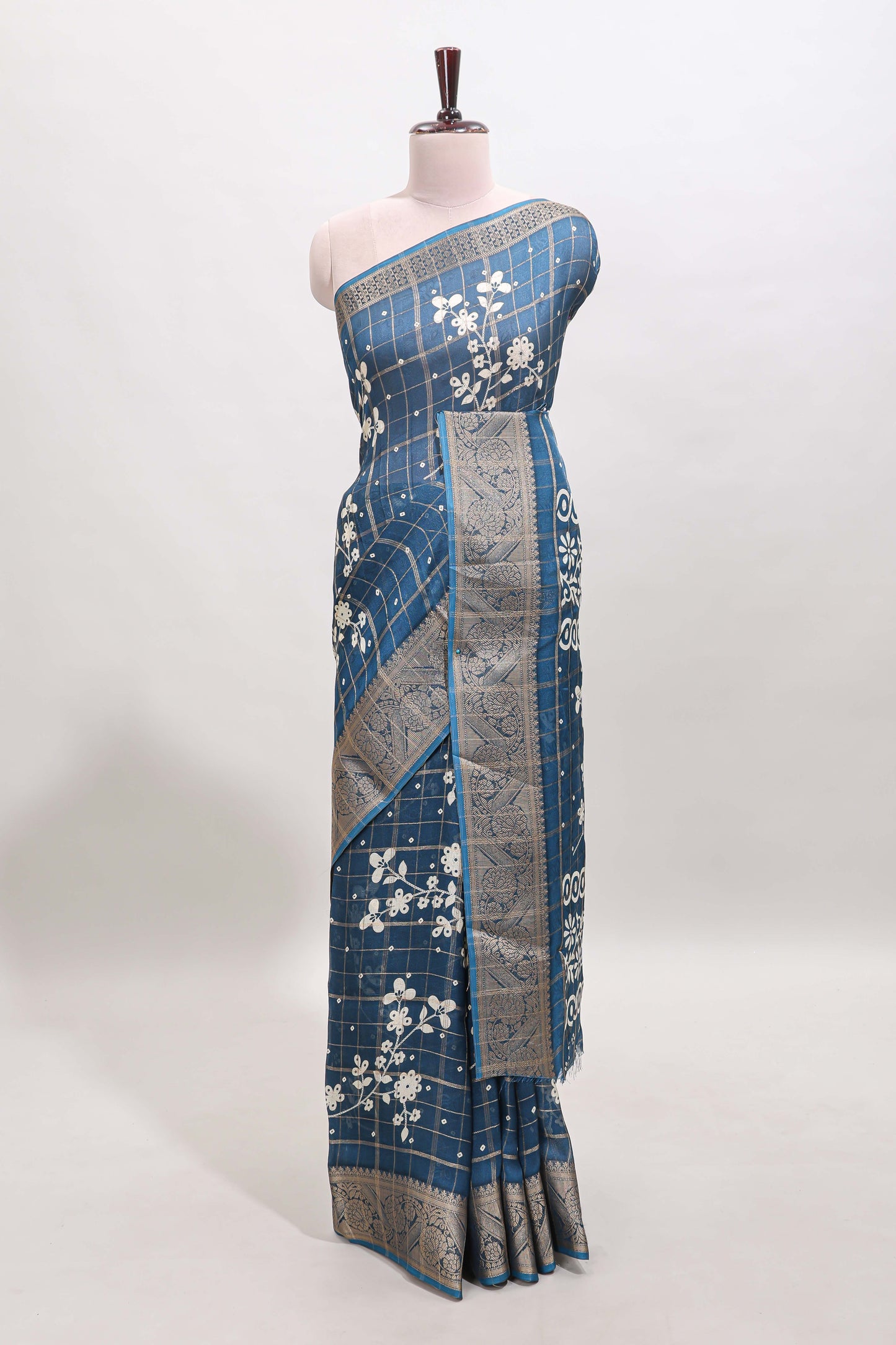 Blue checked floral design dola saree with self zari border and matching blouse