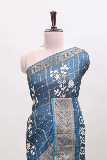 Blue checked floral design dola saree with self zari border and matching blouse