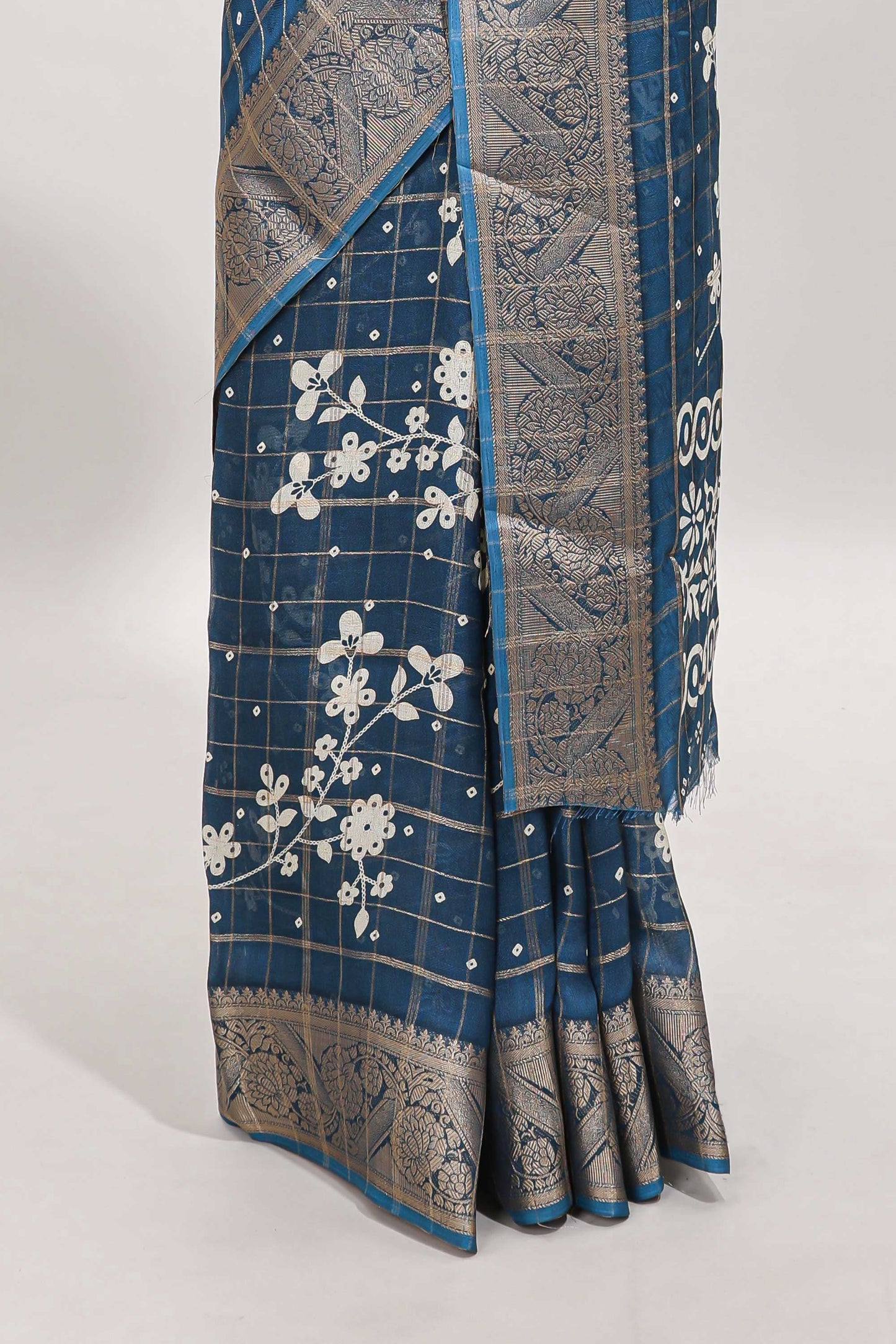 Blue checked floral design dola saree with self zari border and matching blouse