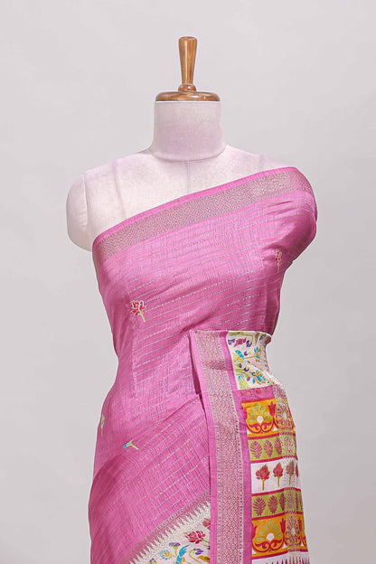 Pink dola silk saree with striped floral motifs and bird & floral bottom design with self zari border and matching blouse