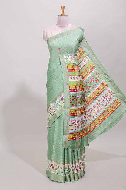 Green dola silk saree with striped floral motifs and bird & floral bottom design with self zari border and matching blouse
