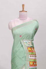 Green dola silk saree with striped floral motifs and bird & floral bottom design with self zari border and matching blouse