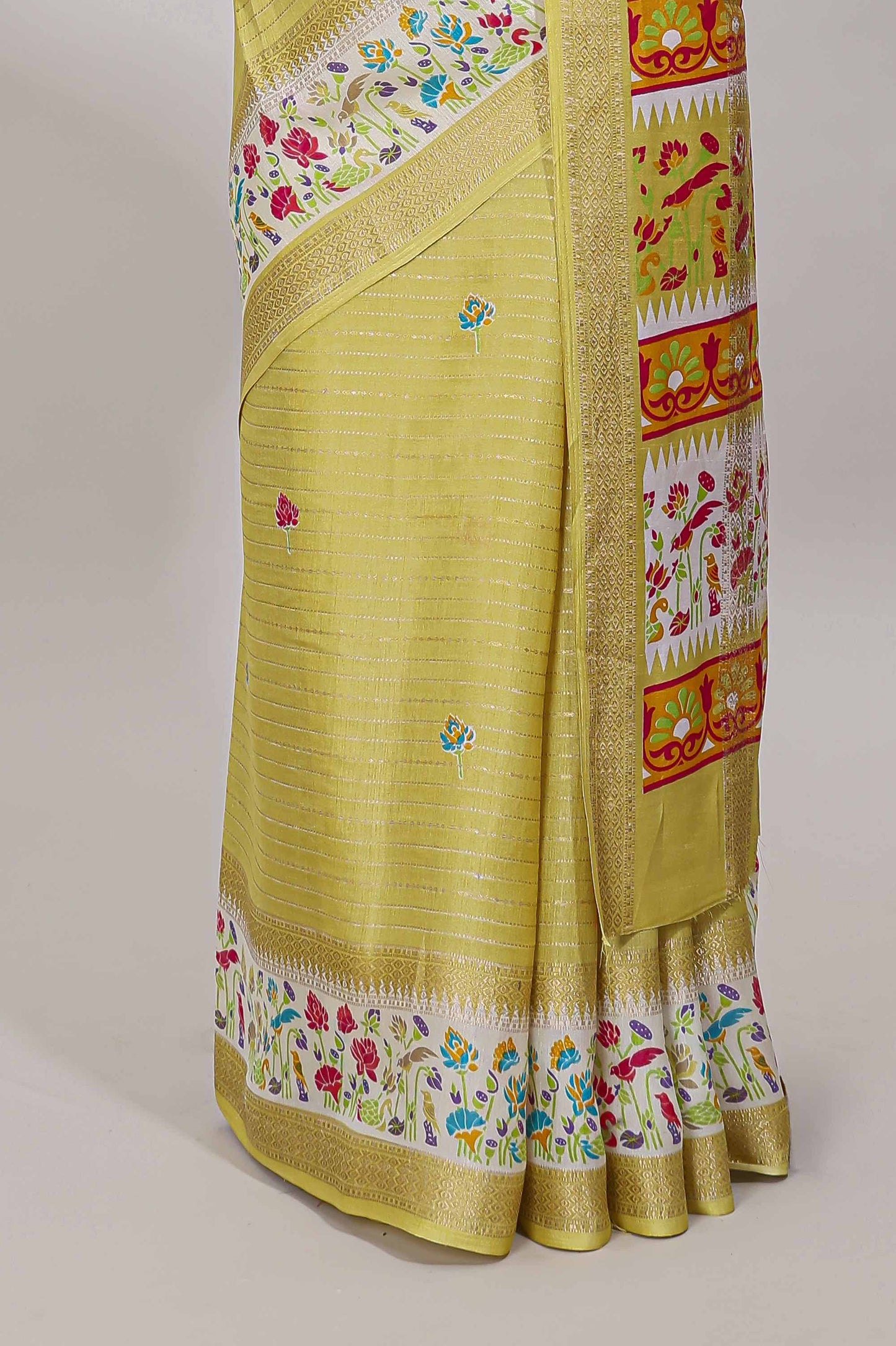 Yellow dola silk saree with striped floral motifs and bird & floral bottom design with self zari border and matching blouse