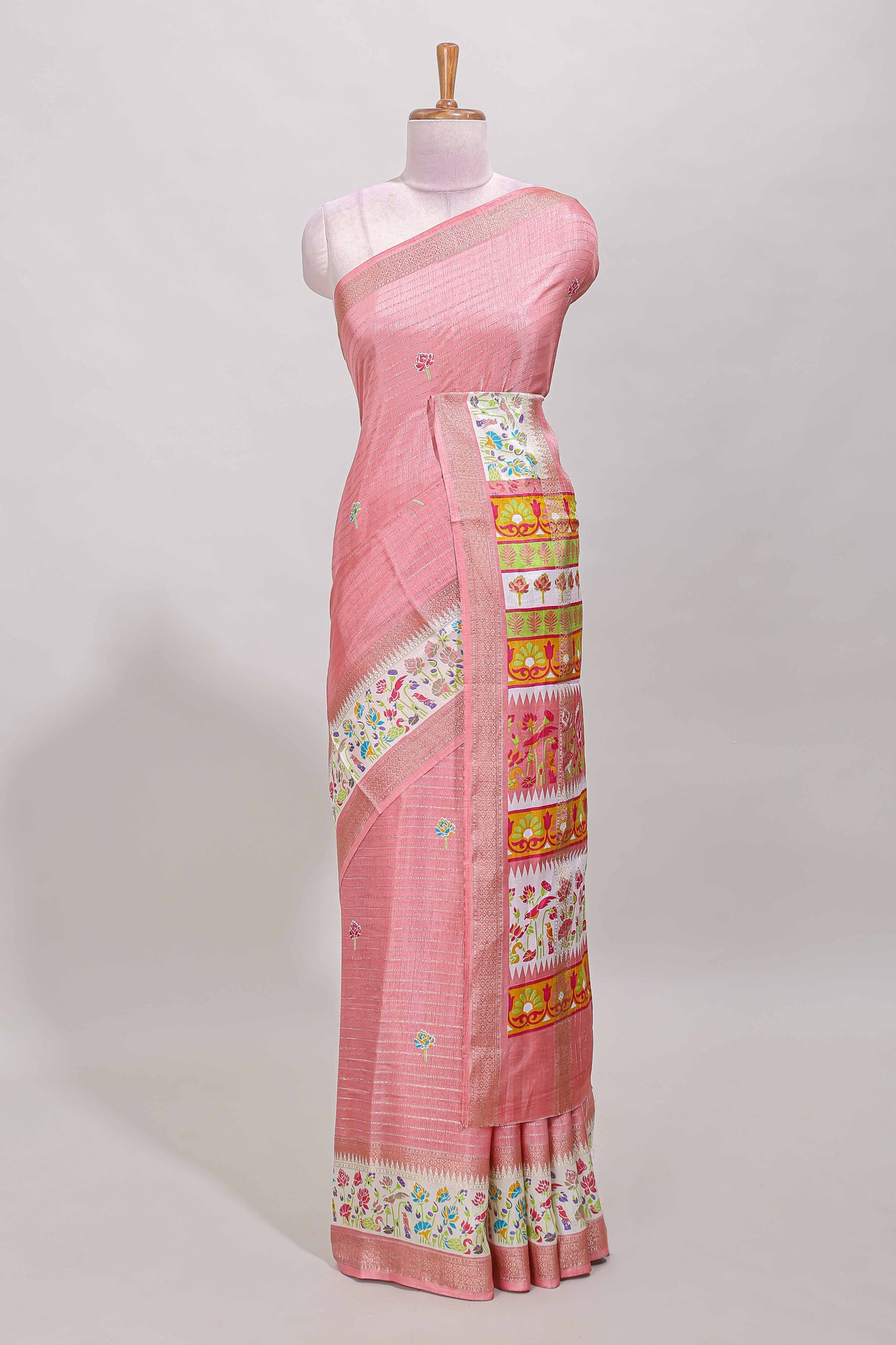 Baby pink dola silk saree with striped floral motifs and bird & floral bottom design with self zari border and matching blouse