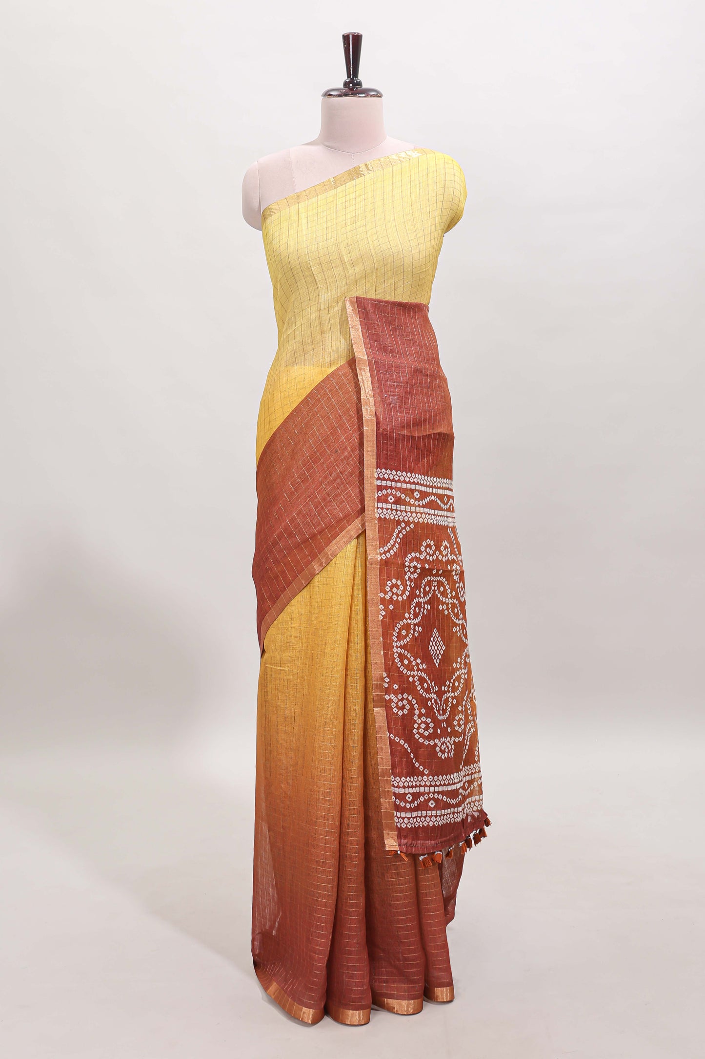 Yellow and brown dual shade checked checked linen cotton saree with self zari border printed blouse