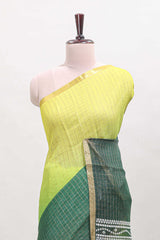 Yellow and green dual shade checked linen cotton saree with self zari border and matching blouse