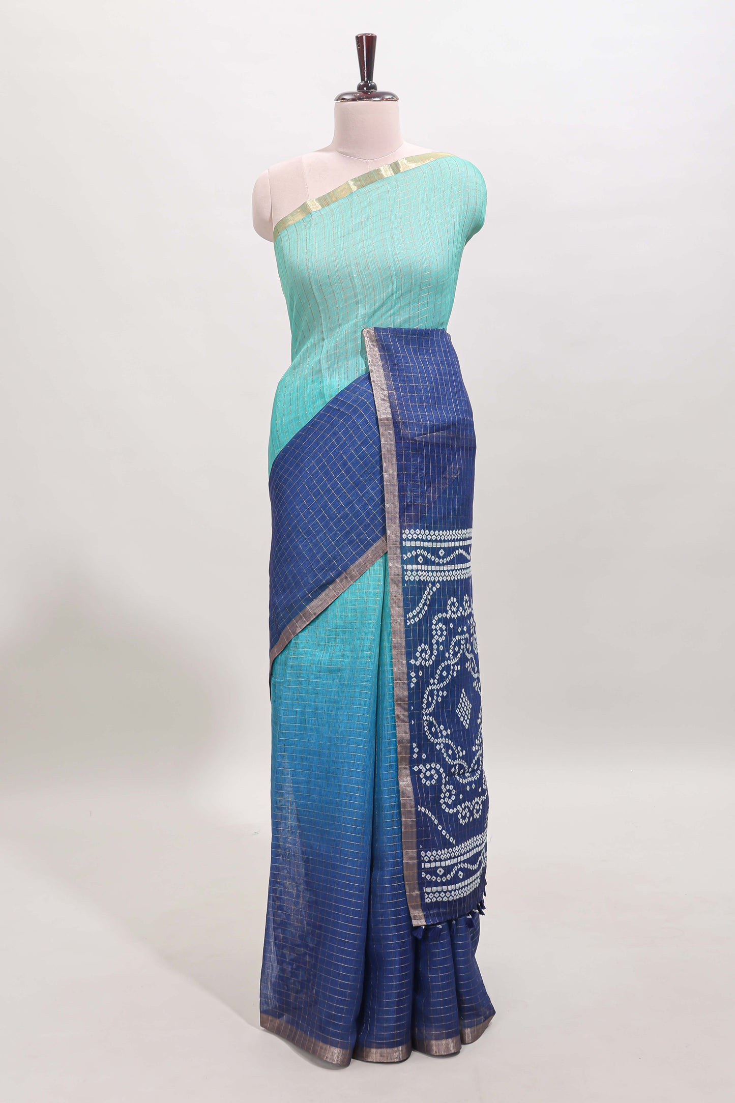 Green and blue dual shade checked checked linen cotton saree with self zari border printed blouse
