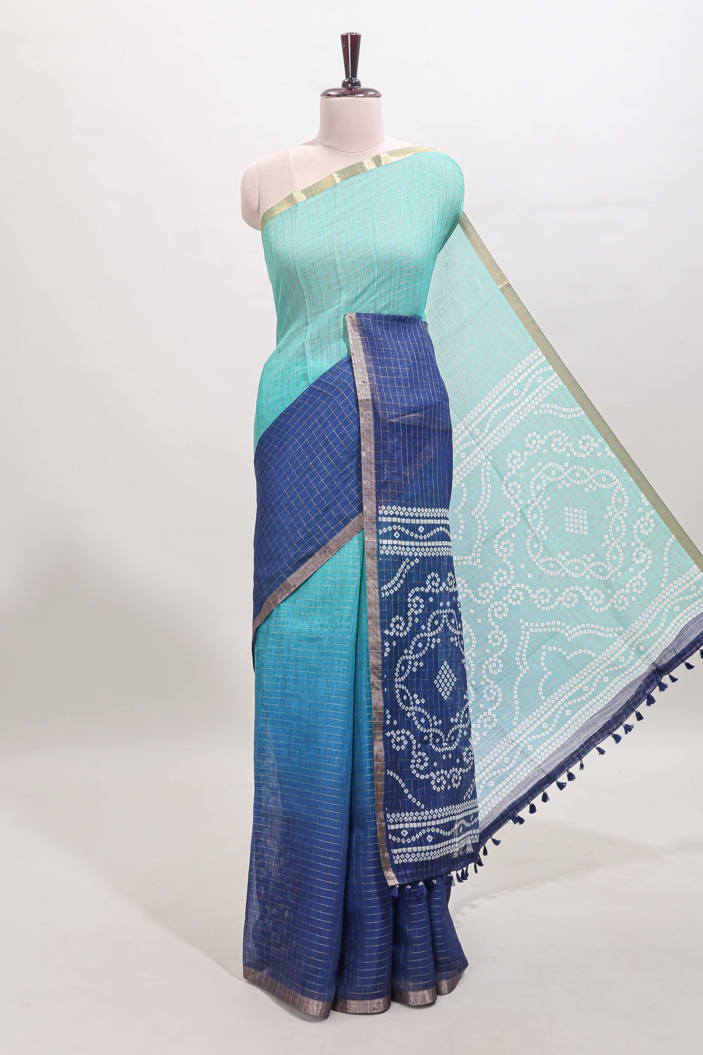 Green and blue dual shade checked checked linen cotton saree with self zari border printed blouse