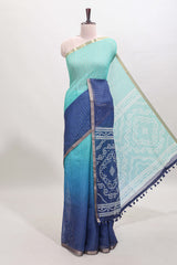 Green and blue dual shade checked checked linen cotton saree with self zari border printed blouse