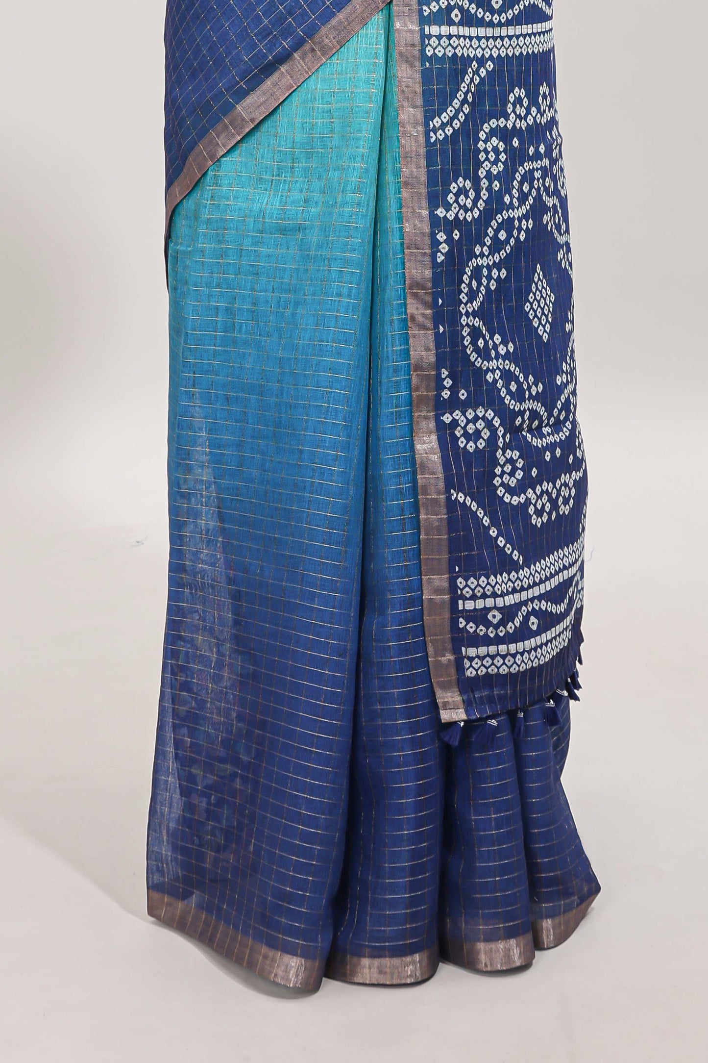 Green and blue dual shade checked checked linen cotton saree with self zari border printed blouse
