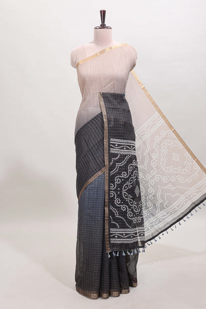 Cream and black dual shade checked checked linen cotton saree with self zari border printed blouse