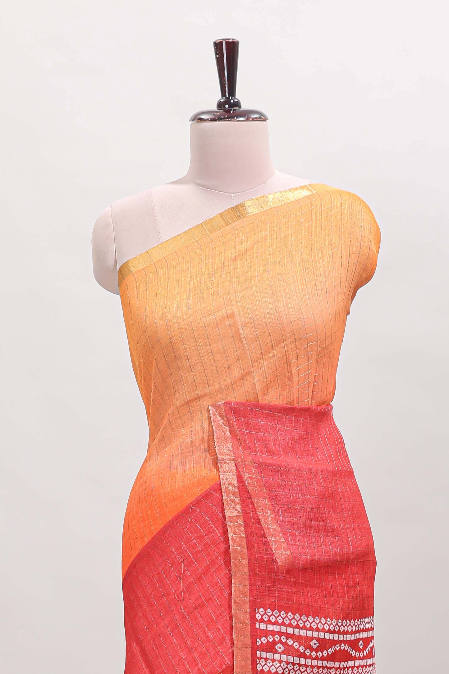 Orange and red dual shade checked checked linen cotton saree with self zari border printed blouse