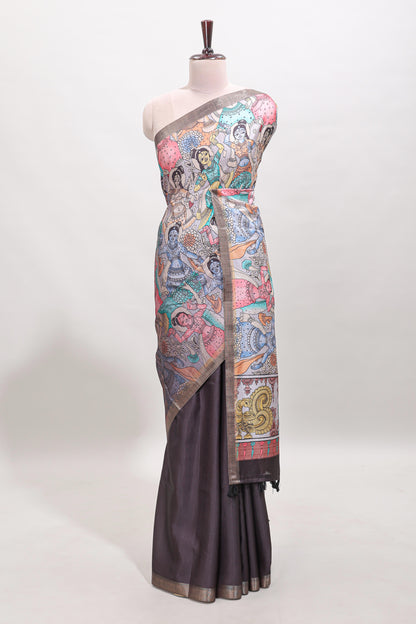 Dark brown kalamkari style tussar saree with self zari border and matching blouse