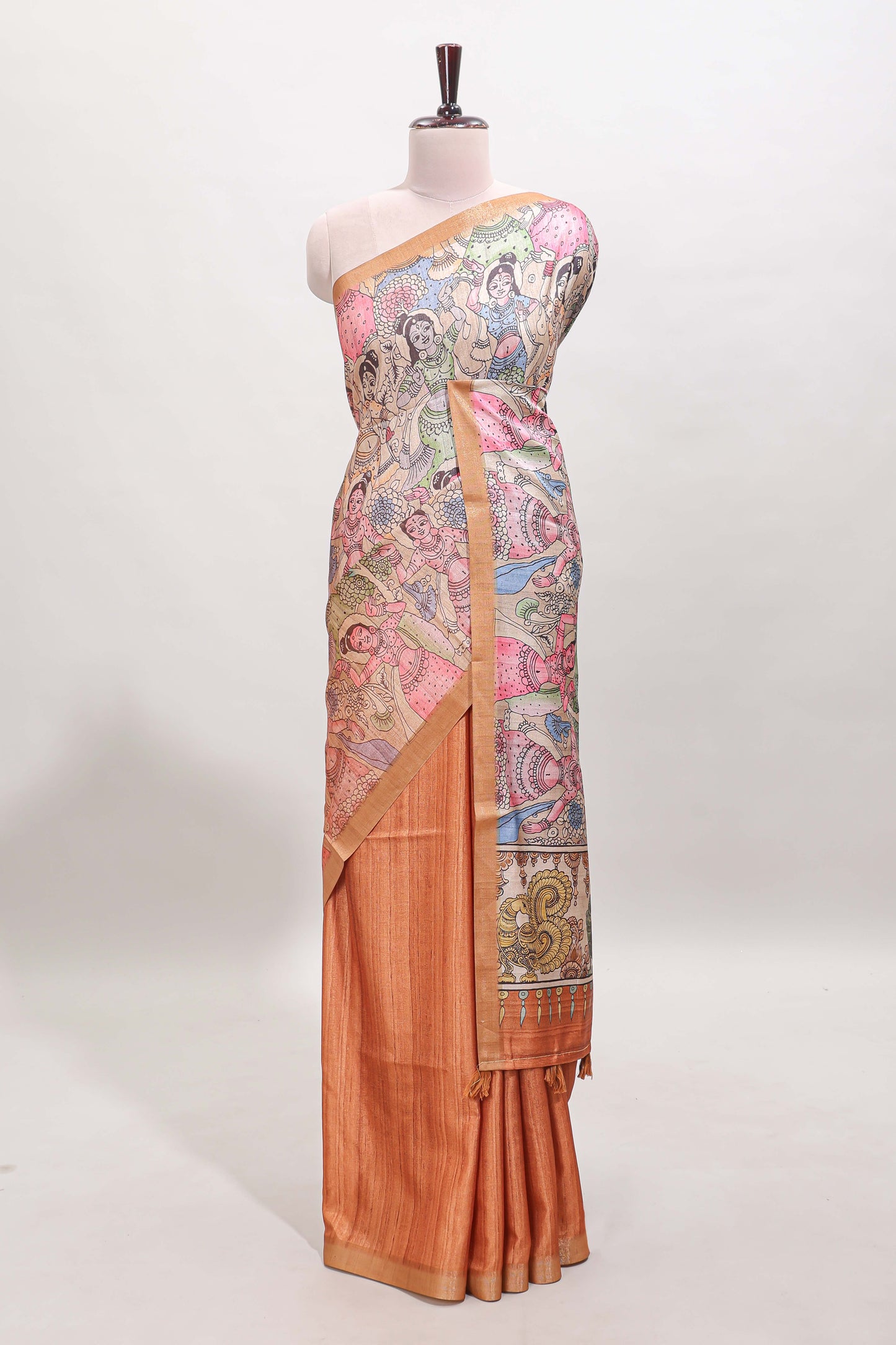 Orange kalamkari style art tussar saree with self zari border and blouse