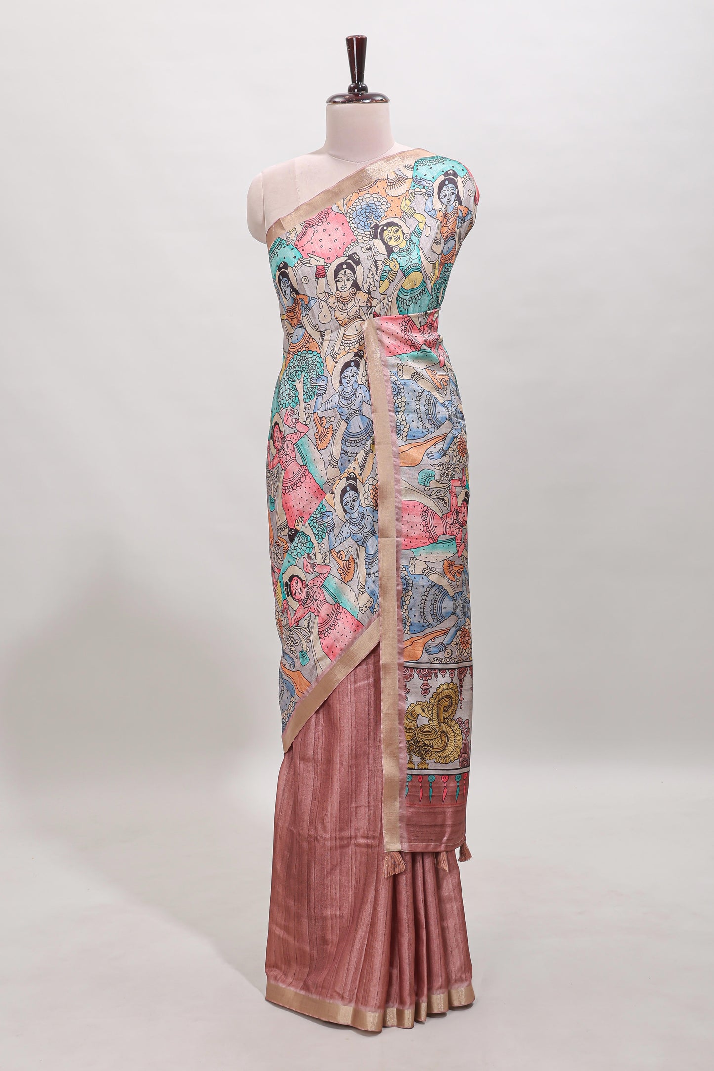 Peach kalamkari style tussar saree with self zari border and matching blouse