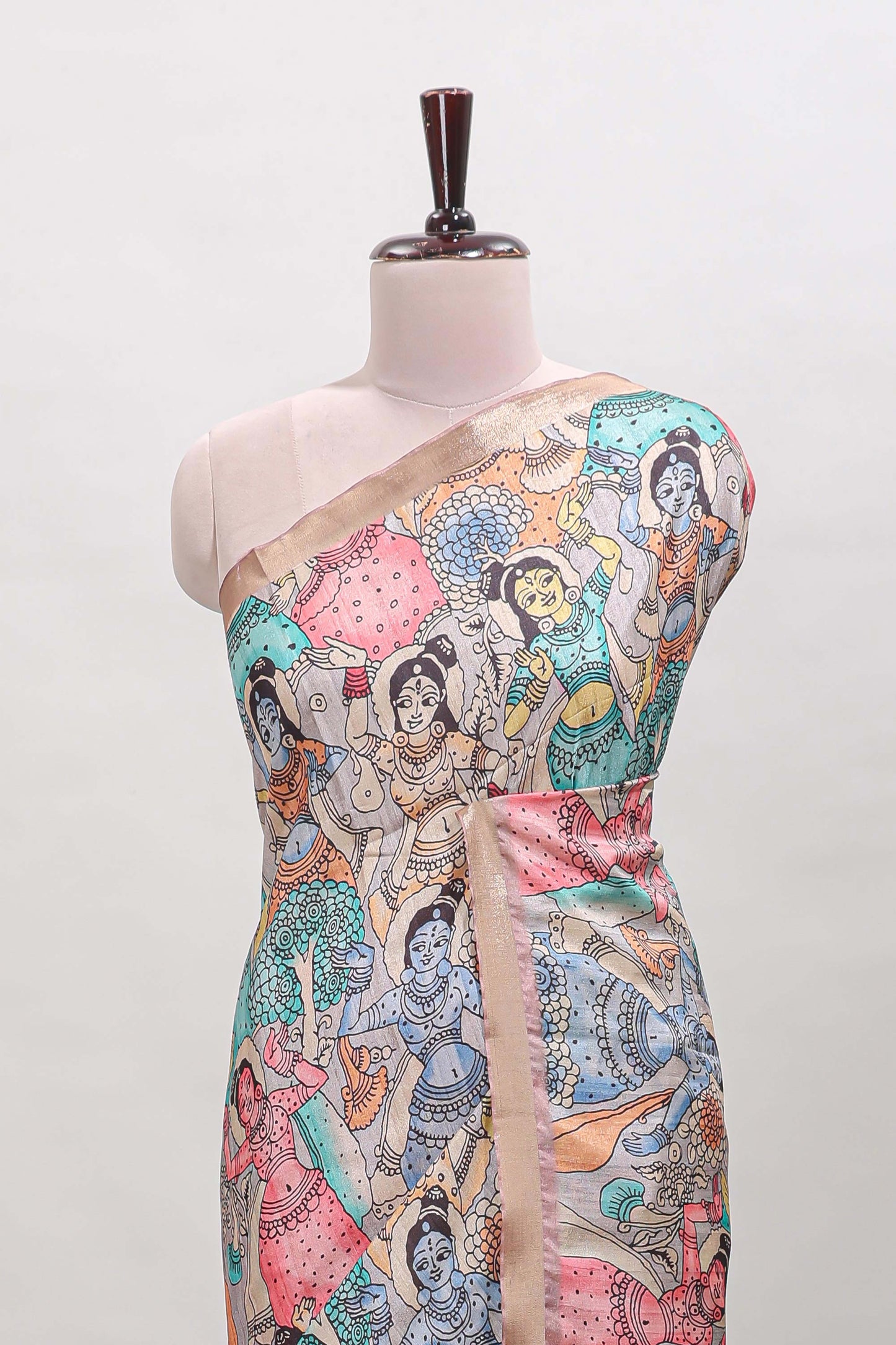 Peach kalamkari style tussar saree with self zari border and matching blouse