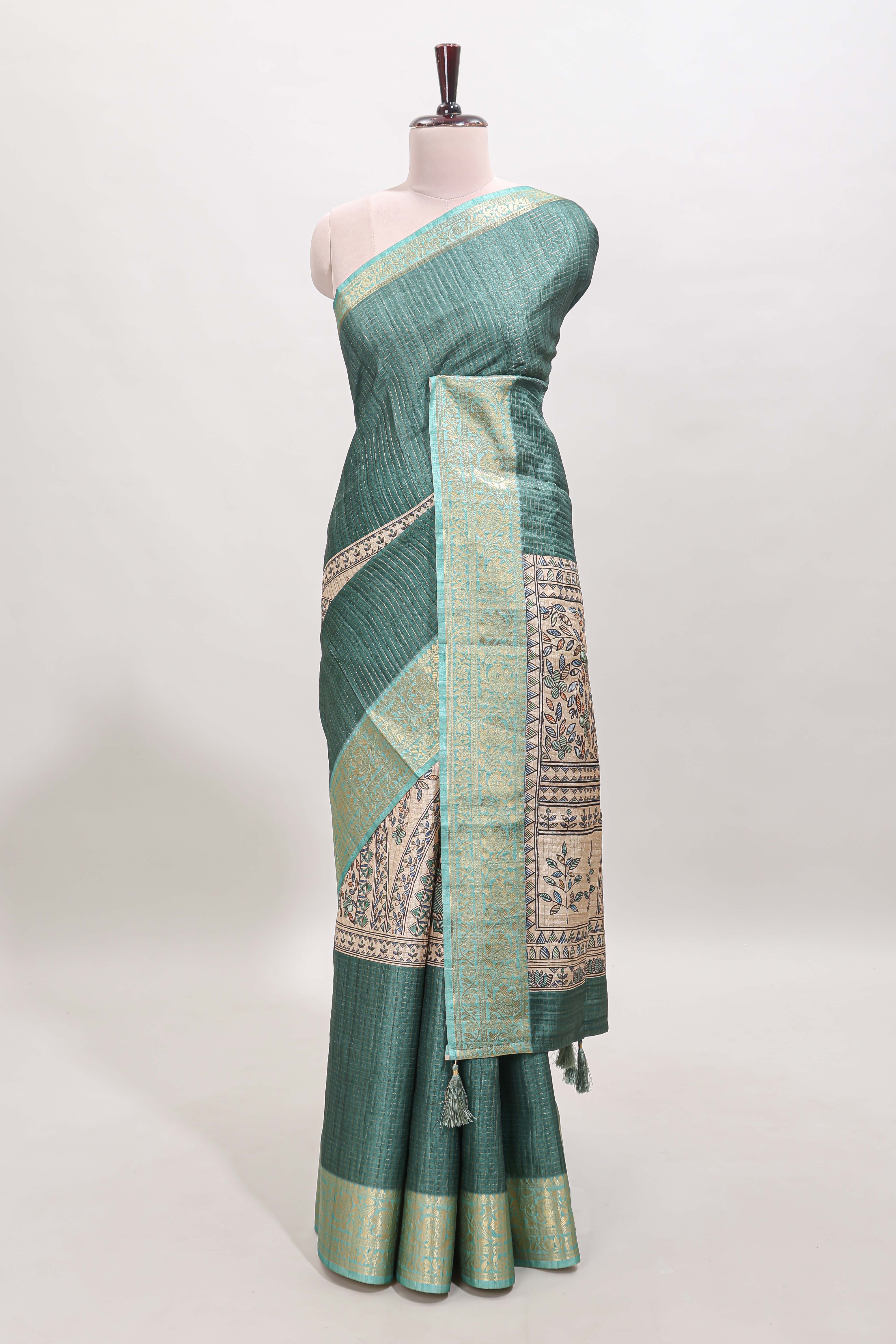 Green ditsy floral print art tussar saree with contrast zari border and matching blouse