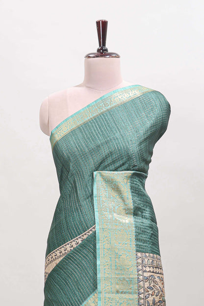 Green ditsy floral print art tussar saree with contrast zari border and matching blouse