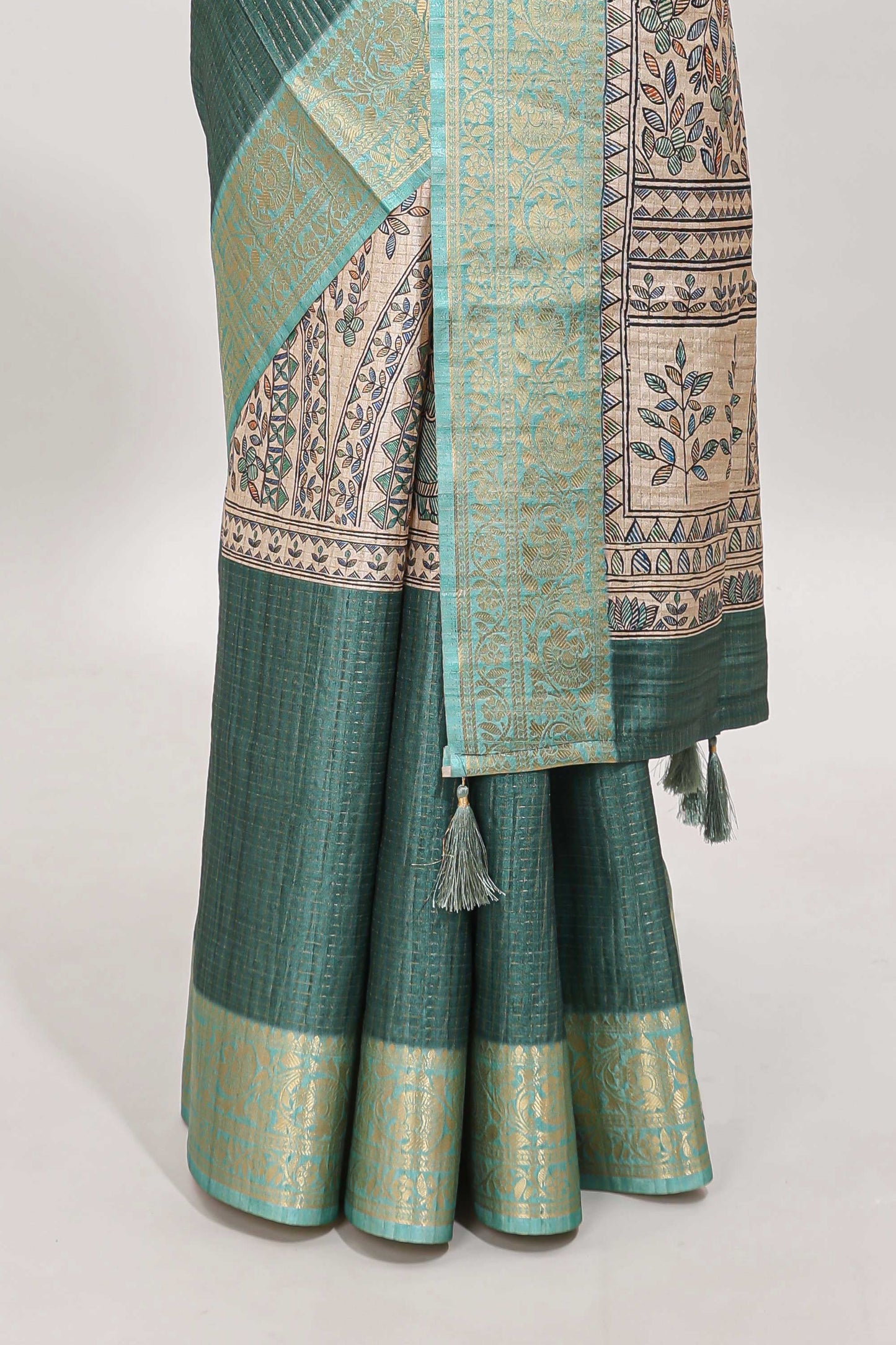 Green ditsy floral print art tussar saree with contrast zari border and matching blouse