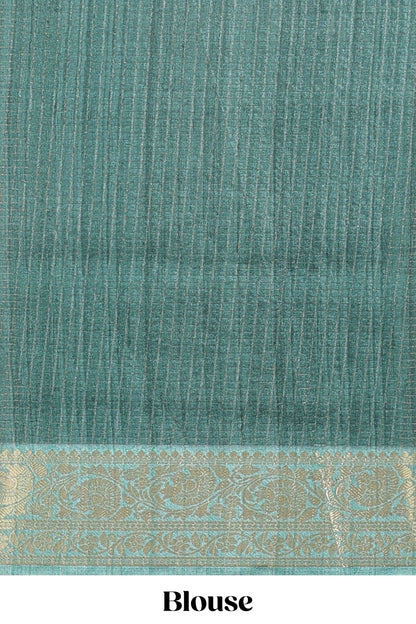 Green ditsy floral print art tussar saree with contrast zari border and matching blouse