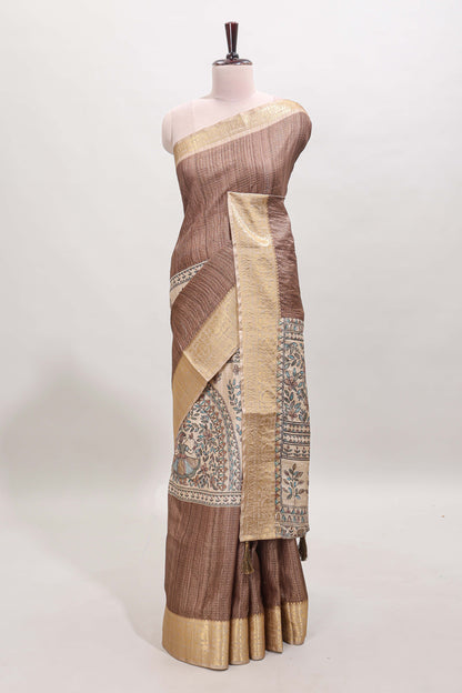 Brown ditsy floral print art tussar saree with contrast zari border and matching blouse