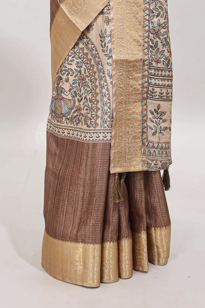 Brown ditsy floral print art tussar saree with contrast zari border and matching blouse