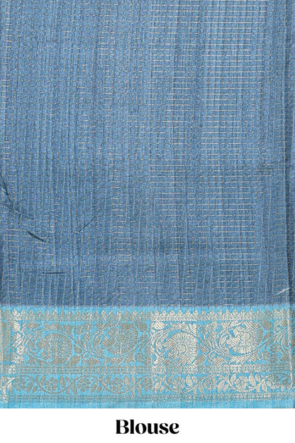 Blue ditsy floral print art tussar saree with contrast zari border and matching blouse