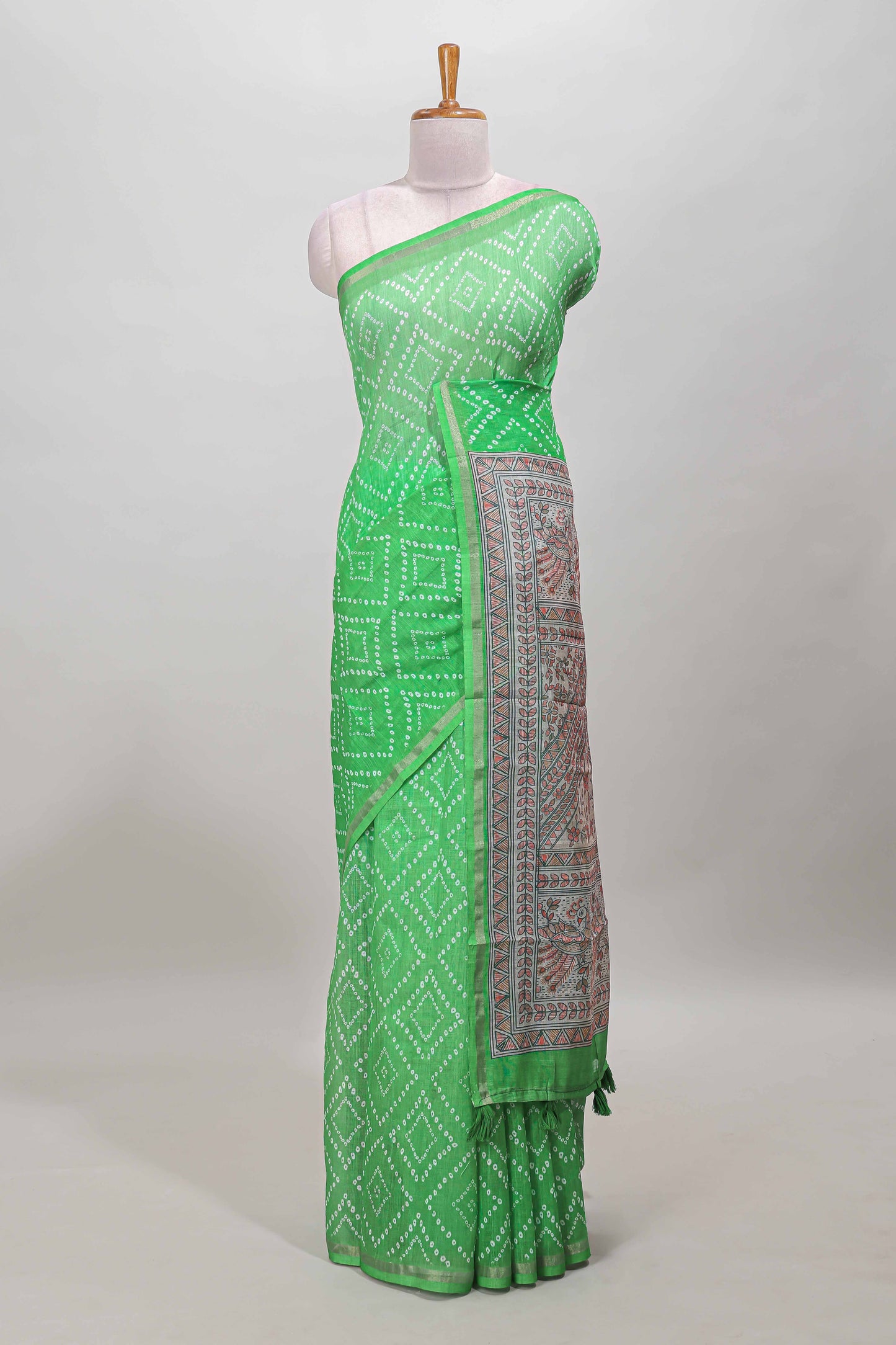 Green geometric pattern bandhani style linen cotton saree with self zari border and contrast printed pallu & blouse