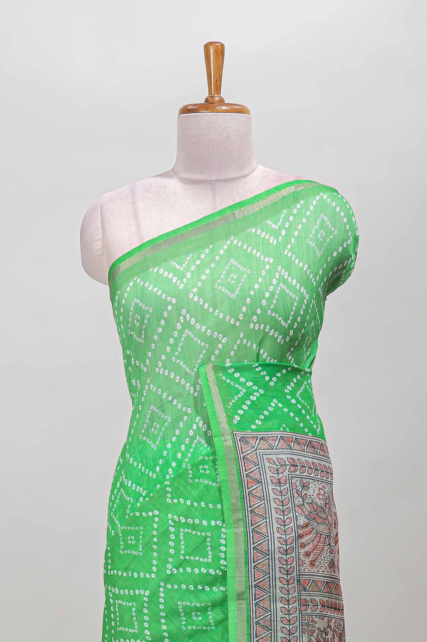 Green geometric pattern bandhani style linen cotton saree with self zari border and contrast printed pallu & blouse