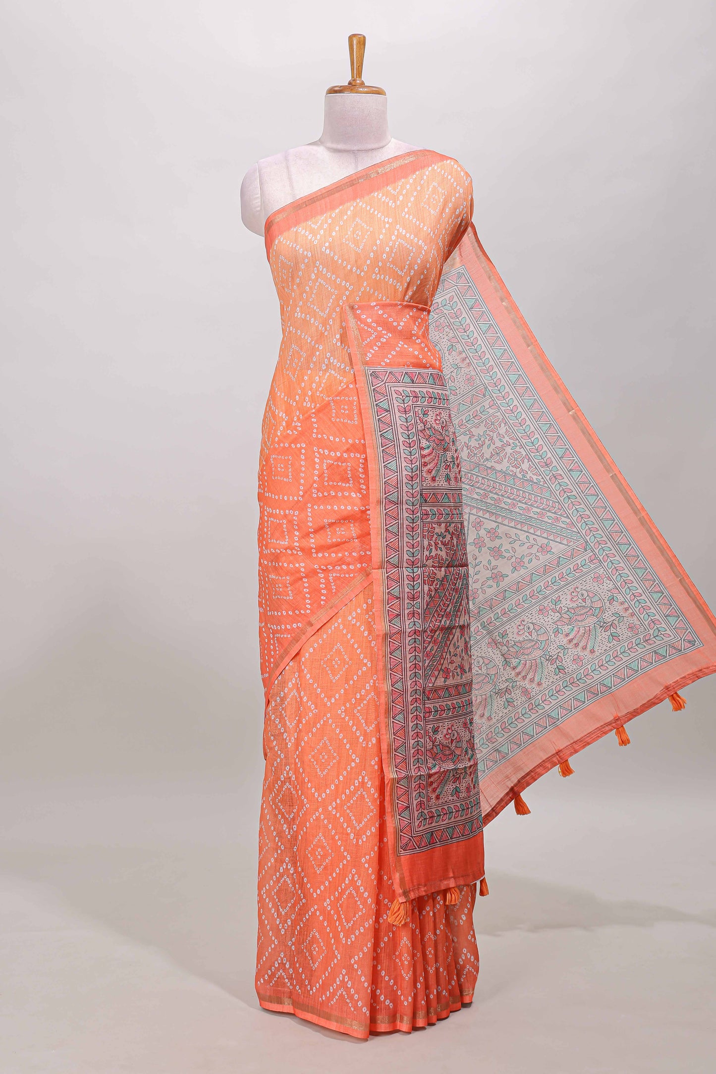 Orange geometric pattern bandhani style linen cotton saree with self zari border and contrast printed pallu & blouse