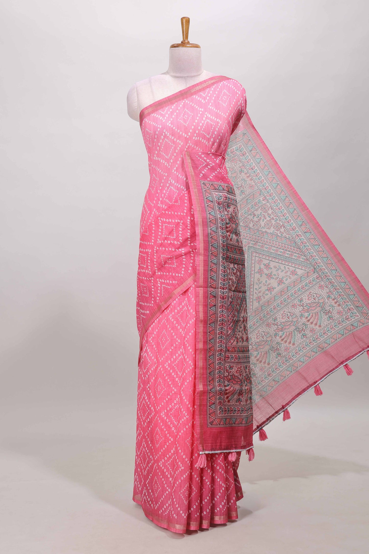 Pink geometric pattern bandhani style linen cotton saree with self zari border and contrast printed pallu & blouse