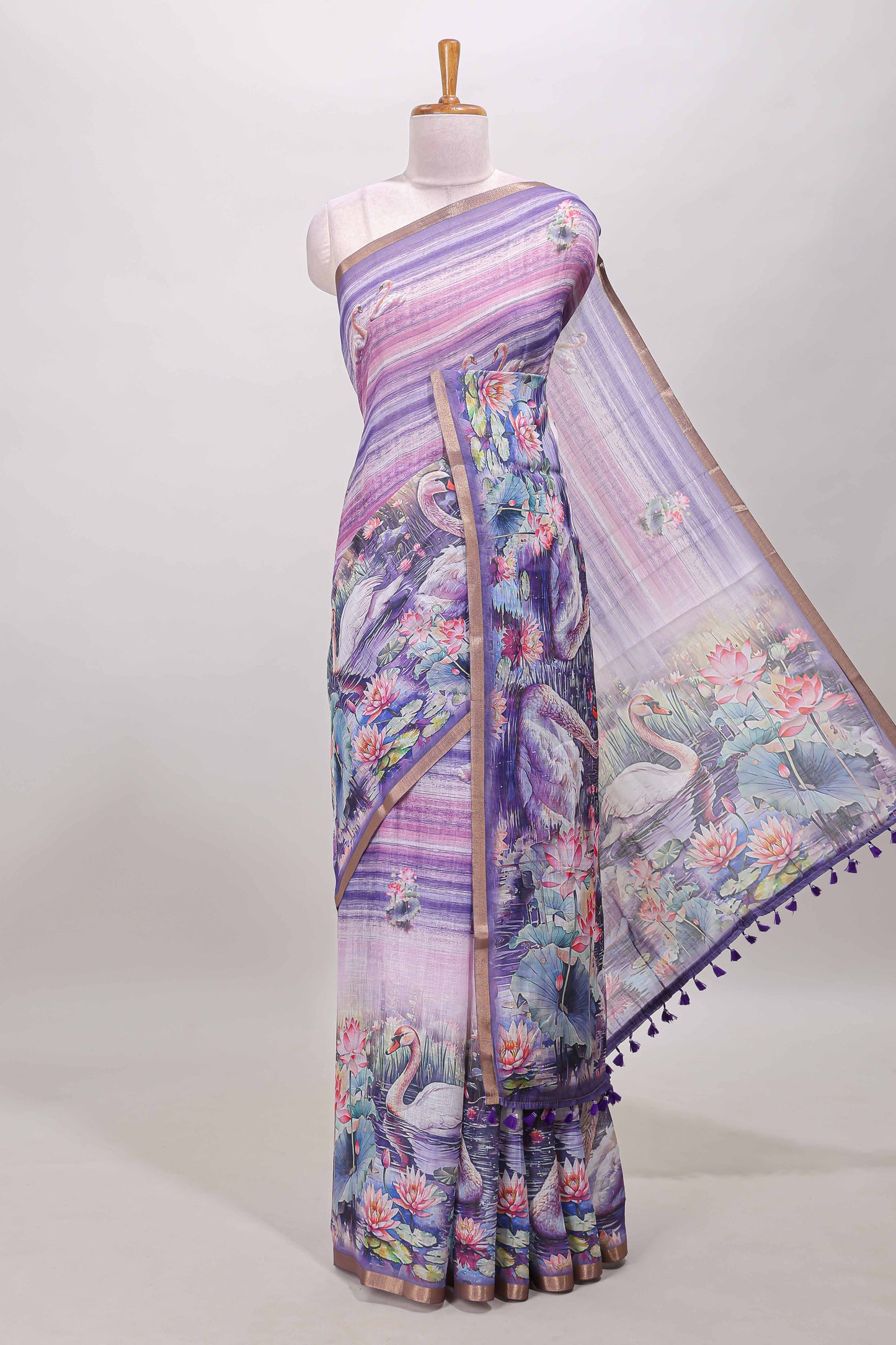 Lavender linen cotton saree with swan & lotus pond print, self zari border and matching printed pallu