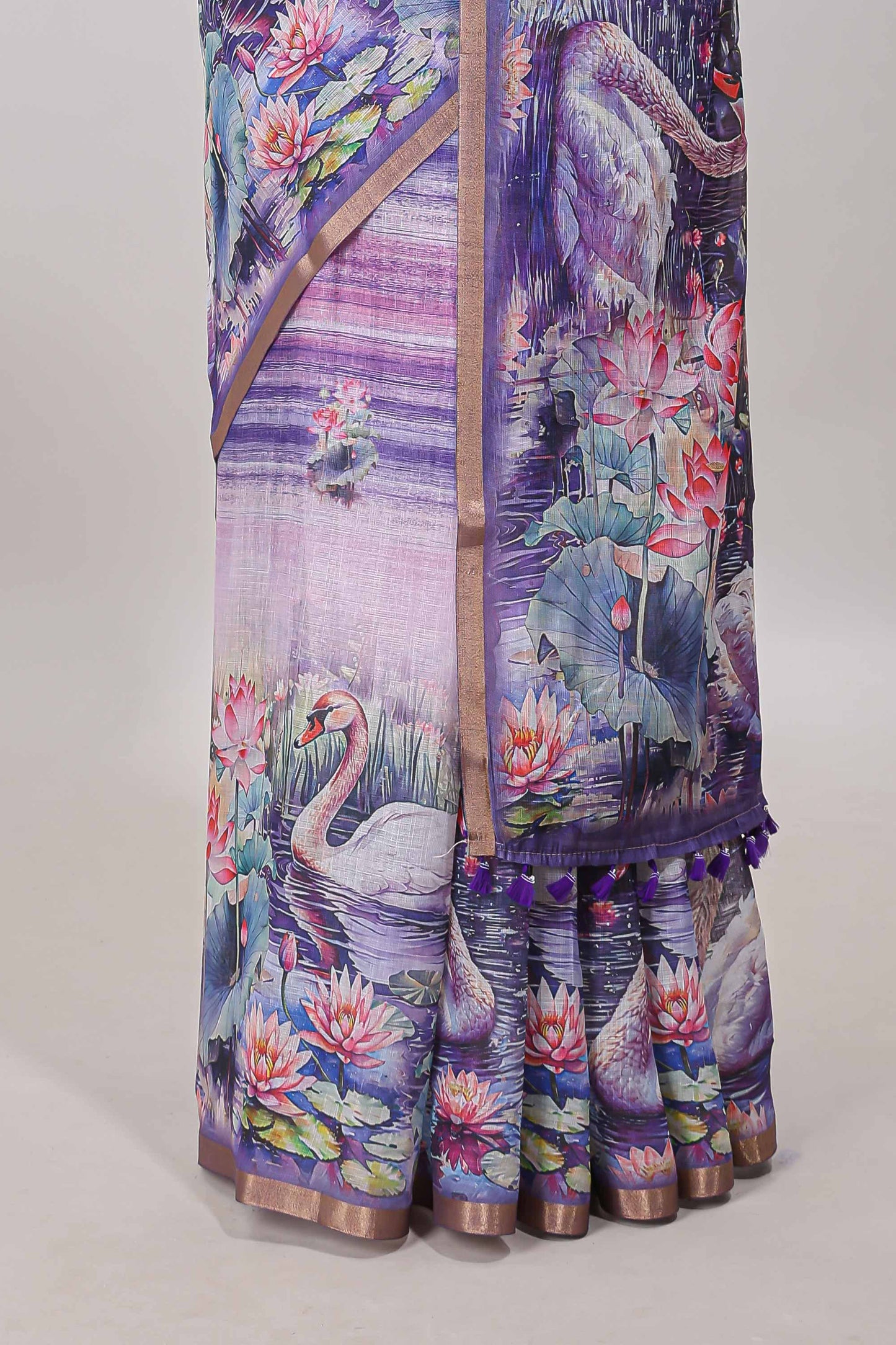 Lavender linen cotton saree with swan & lotus pond print, self zari border and matching printed pallu