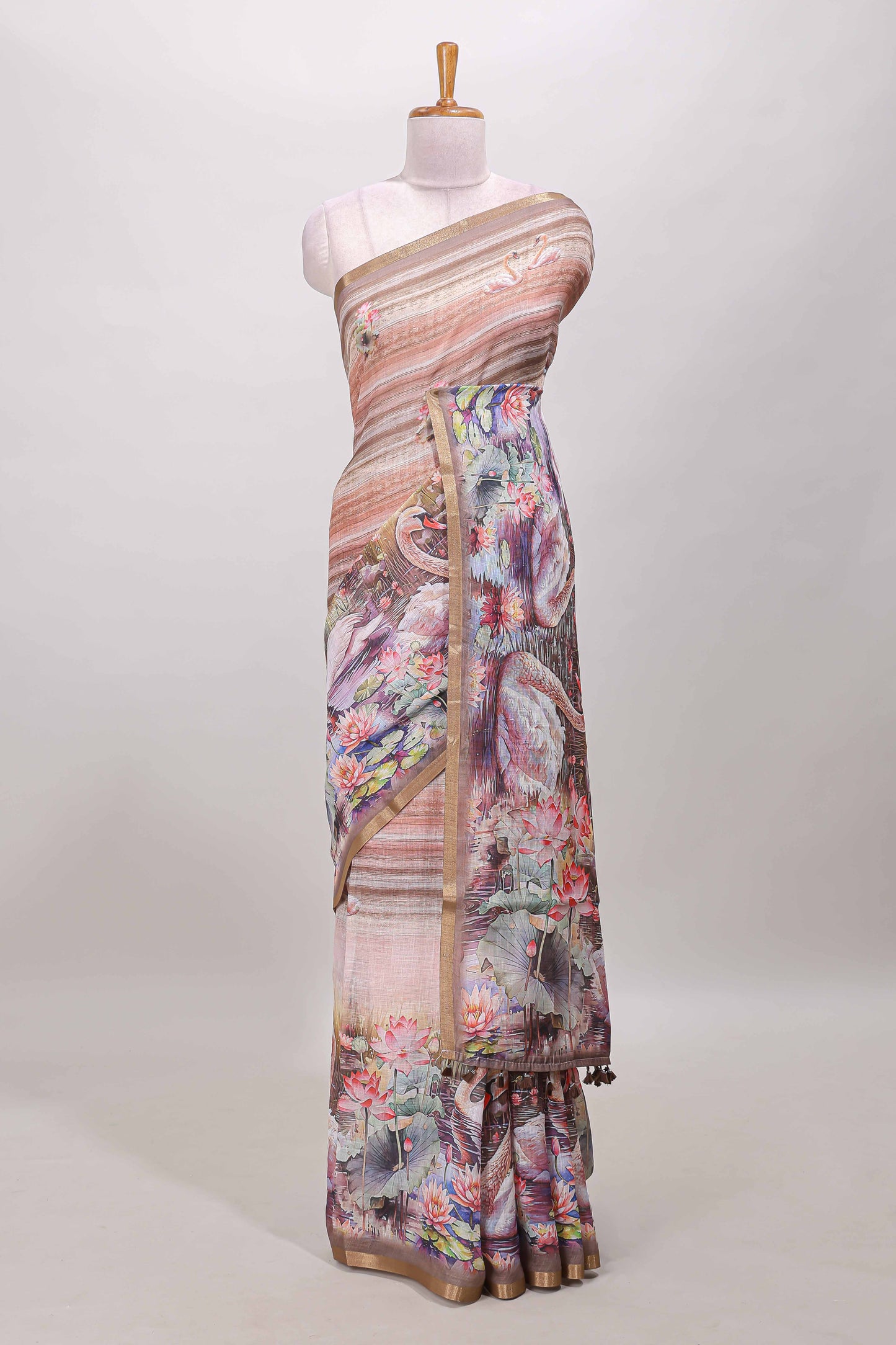 Brown linen cotton saree with swan & lotus pond print, self zari border and matching printed pallu