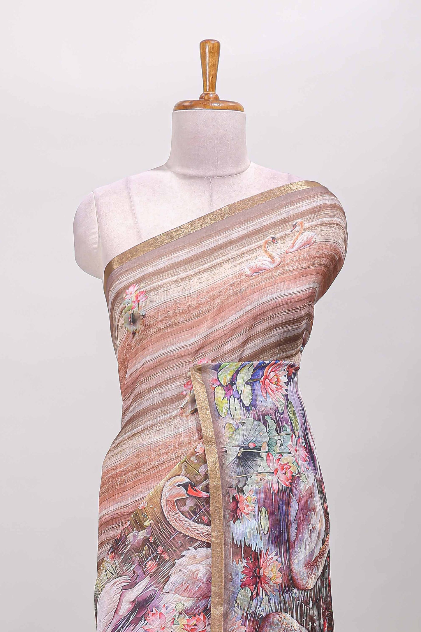 Brown linen cotton saree with swan & lotus pond print, self zari border and matching printed pallu