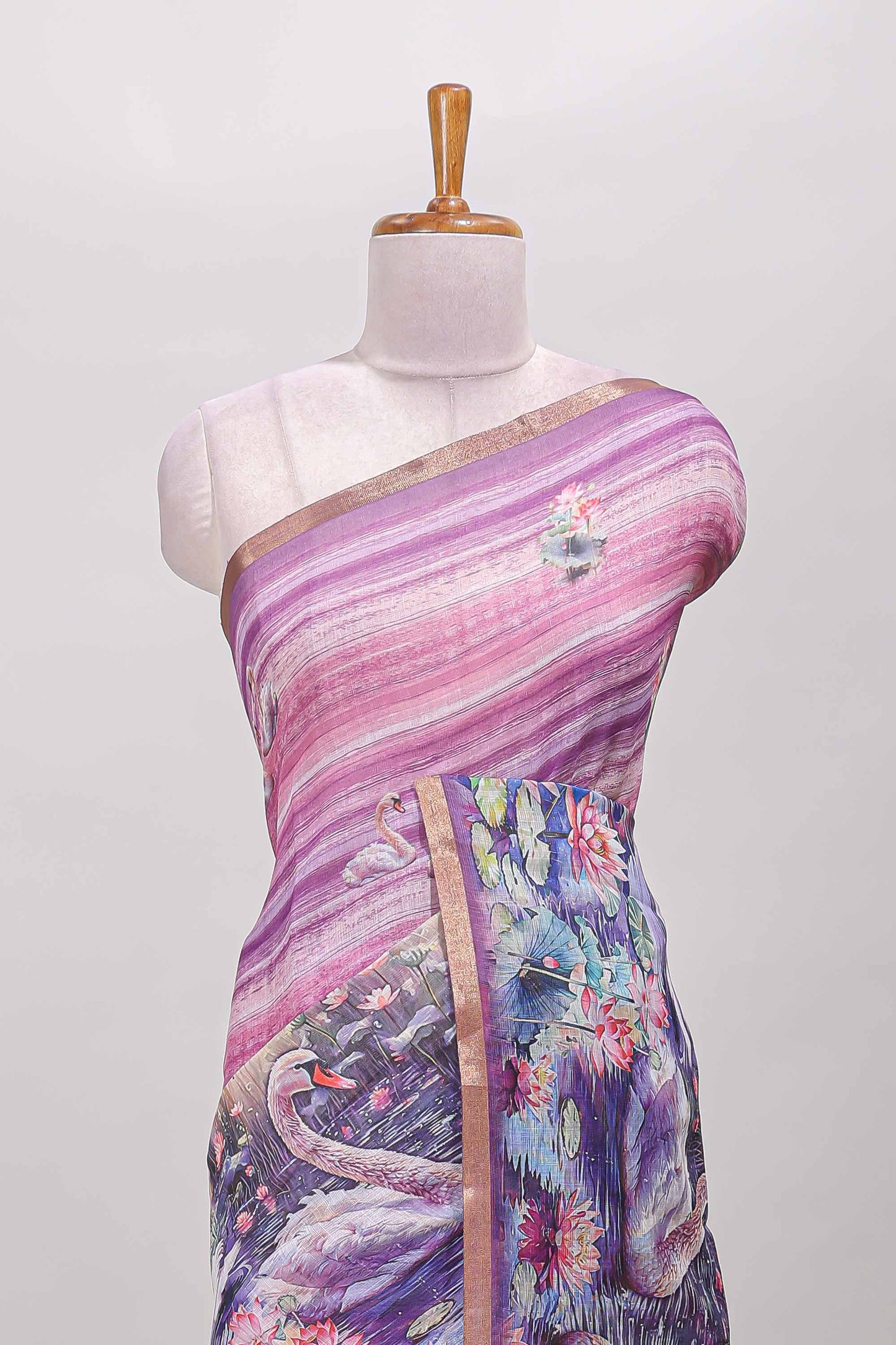 Pink linen cotton saree with swan & lotus pond print, self zari border and matching printed pallu